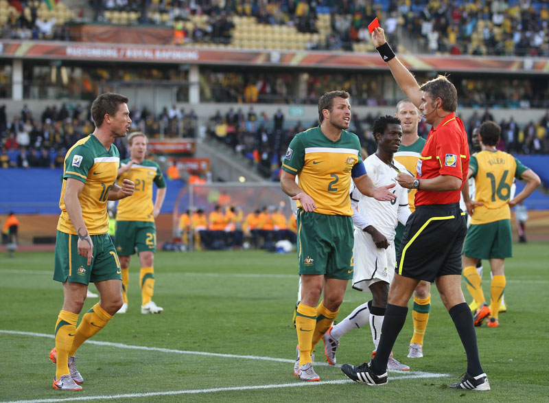 Harry Kewell of Australia is sent off against Ghana.